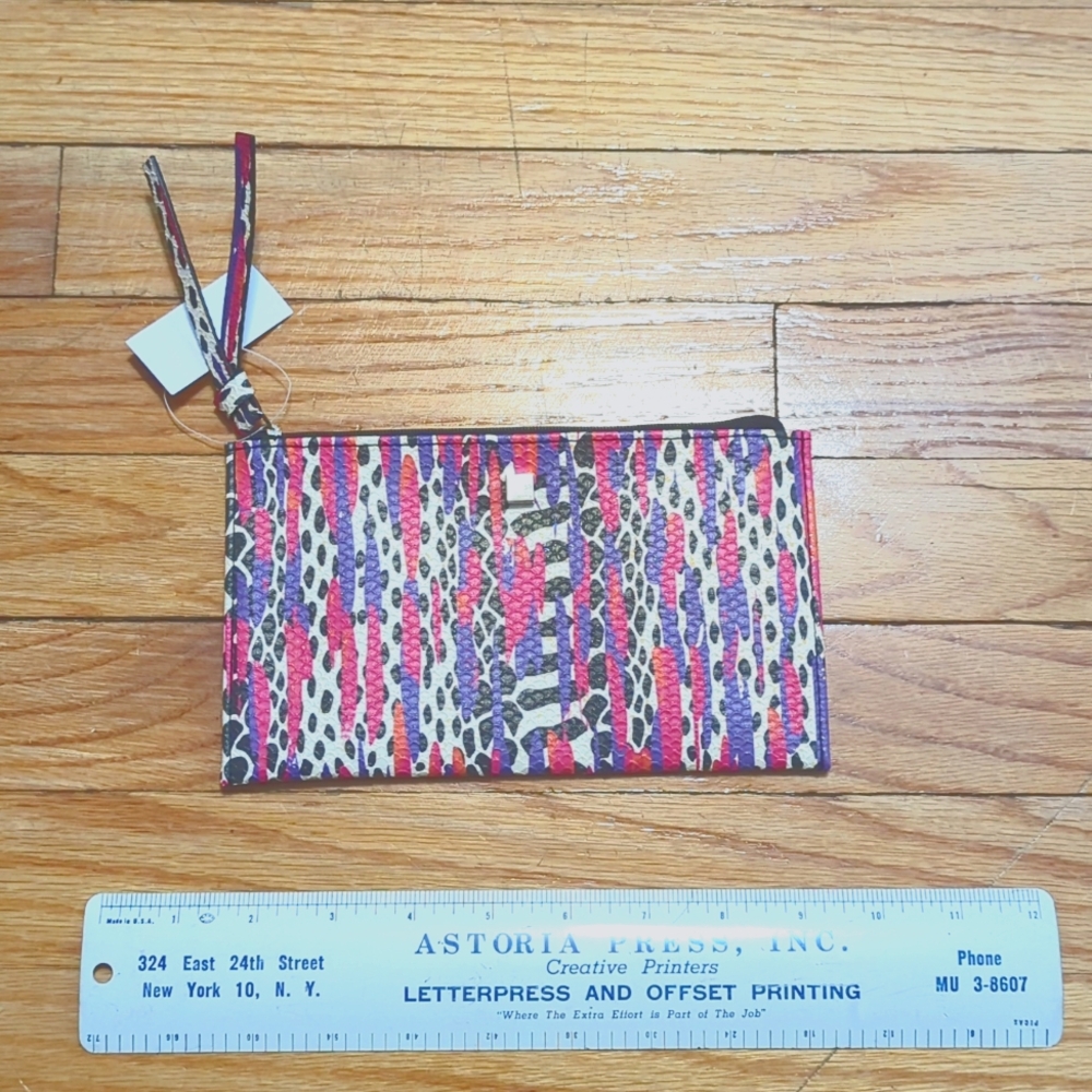 Coty cosmetic clutch purple pink animal print